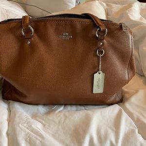 Coach med sized marks on front and wear